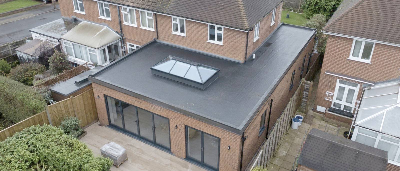 Completed rear extension seen from above with a flat roof and lantern