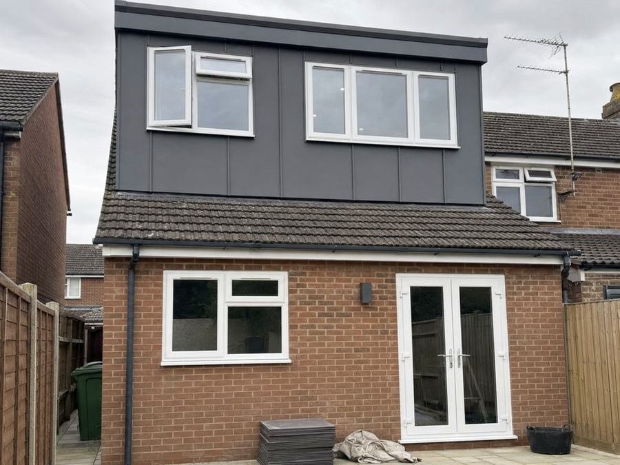 Single storey rear extension with french doors below a new loft dormer