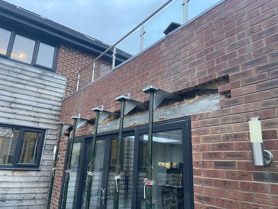 New brickwork and glazing built off the completed foundations