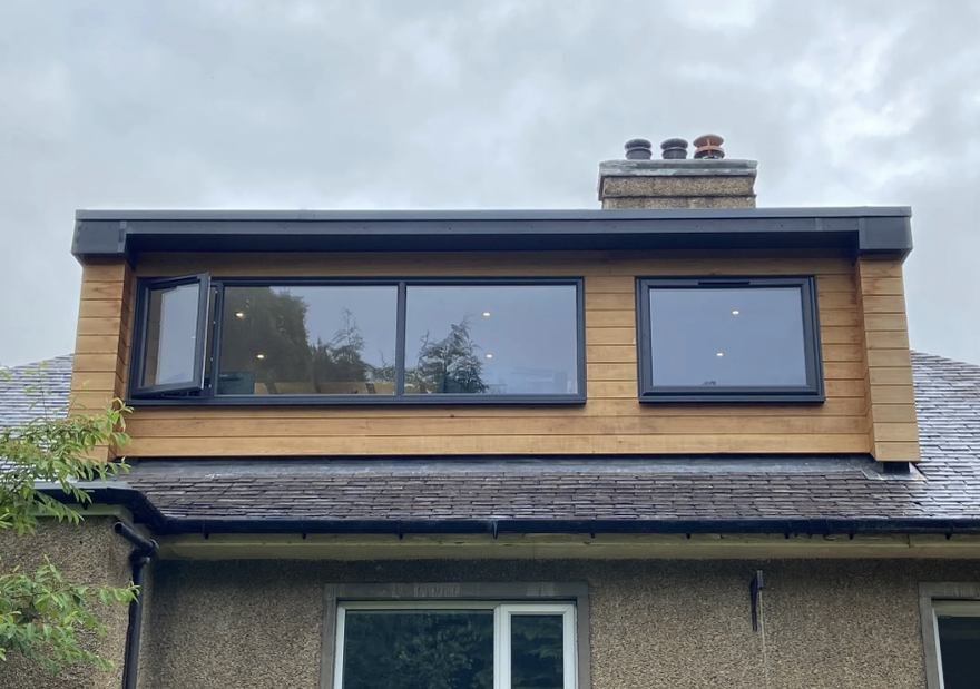 Cedar clad rear dormer with grey aluminium windows