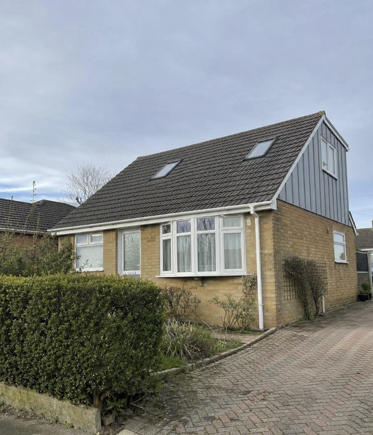 Dormer conversion on a bungalow with rooflights to the front