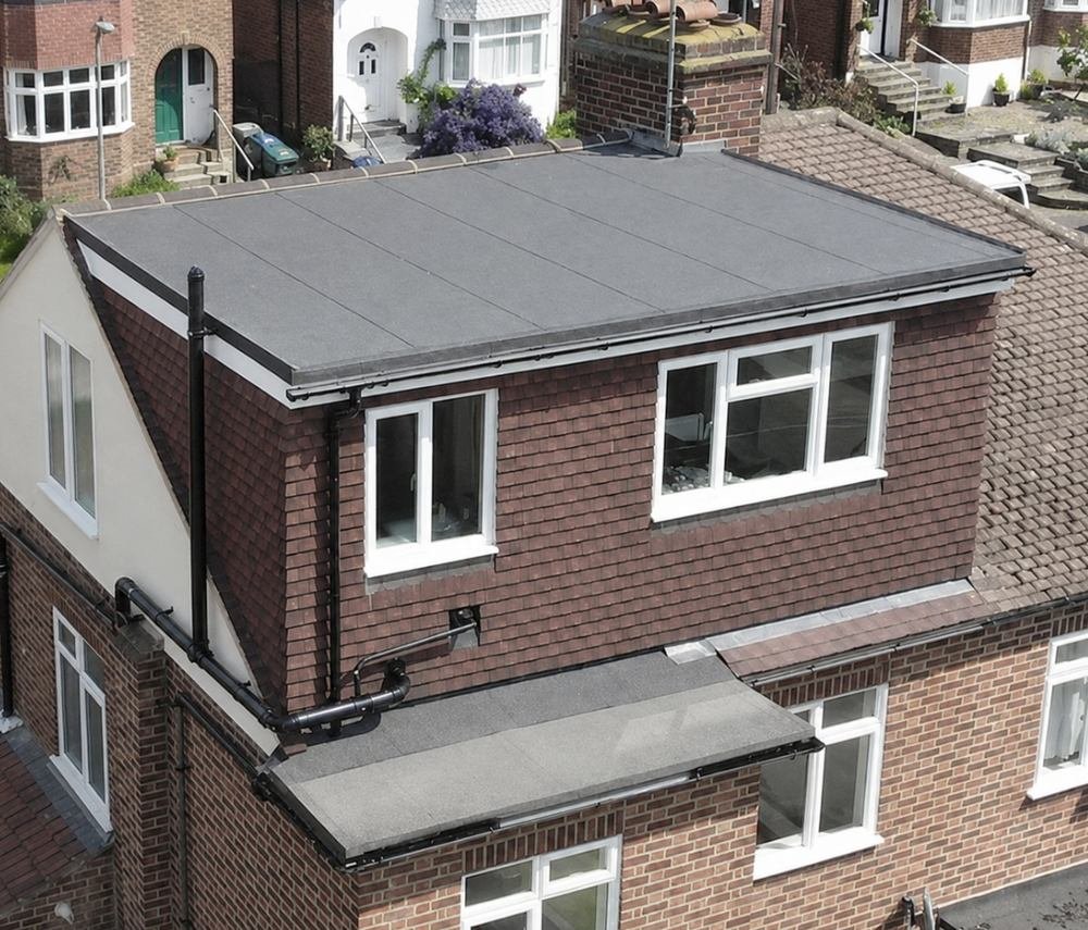 Flat roof dormer seen from above showing the finished roof covering